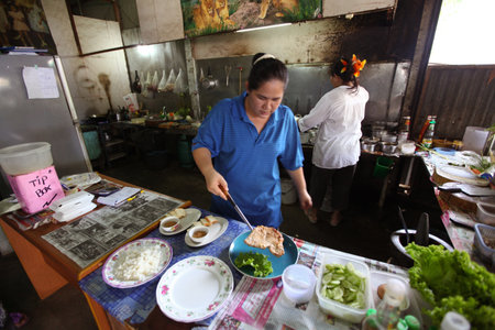 KO CHANG, THAILAND - JANUARY 6:  Unknown cooks prepare food at a thai restaurant on January 6, 2012 in Ko Chang, Thailand. Due to with tourist development in island since 2000 opens increasing number of restaurants.のeditorial素材