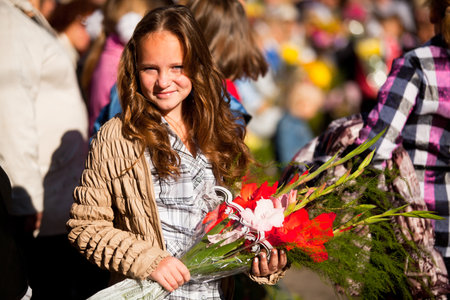 Unidentified children during celebration Knowledge Day on Sept 1, 2012 in Podporozhye, Russia. Knowledge Day originated in the USSR on 1984, and celebrated annually.のeditorial素材