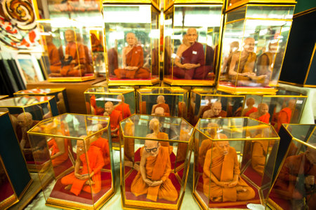 BANGKOK - APR 24: Shop windows with mannequins monks at Chatuchak Weekend Market April 24, 2012 in...