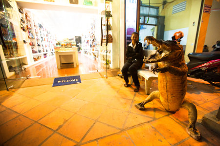 SIEM REAP, CAMBODIA - DEC 13: Shop leather Siamese crocodile, Dec 13, 2012 on Siem Reap, Cambodia. Siamese crocodile in almost all countries, except Cambodia, is under threat of extinction. The total number of species is estimated to be 5000 individuals.のeditorial素材