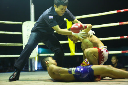 CHANG, THAILAND - FEB 22: Unidentified Muay Thai fighters compete in an amateur kickboxing match,...