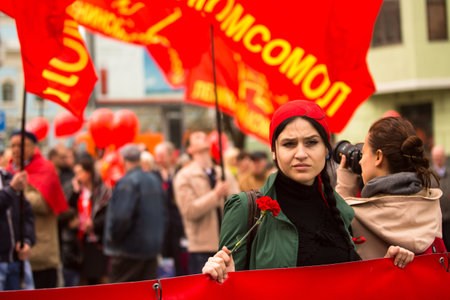 MOSCOW - MAY 1: Communist party supporters take part in a rally marking the May Day, May 1, 2013 in Moscow, Russia.のeditorial素材