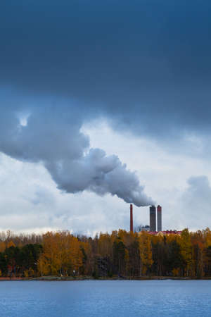 Air pollution by smoke coming out of factory chimneys.の写真素材