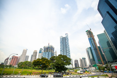 SINGAPORE - APR 15: A view of city in Marina Bay business district on Apr 15, 2012 on Singapore. Asian financial center the city state is one of the most dynamically developing countries in the world.のeditorial素材