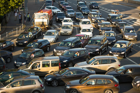 MOSCOW - JUNE 13: Cars stands in traffic jam on the city center, June 13, 2013, Moscow Russia. Moscow Mayor Sobyanin reconstructs suburban railways, to solve problem of traffic jams in 2016.のeditorial素材