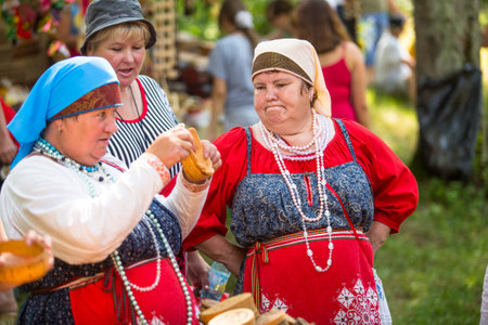 TERVENICHI, RUSSIA - JUL 7: Local people celebrated Ivan Kupala Day, Jul 7, 2013, Tervenichi, Russia. The celebration relates to the summer solstice and includes a number of fascinating Pagan rituals.のeditorial素材
