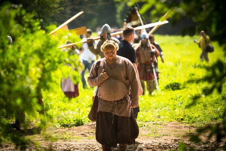STARAYA LADOGA, RUSSIA - JULY 13: Unidentified participants during of international historical festival of medieval culture Ladogafest-2013 (12-14 of Jul) on July 13, 2013 on Staraya Ladoga, Russia.のeditorial素材