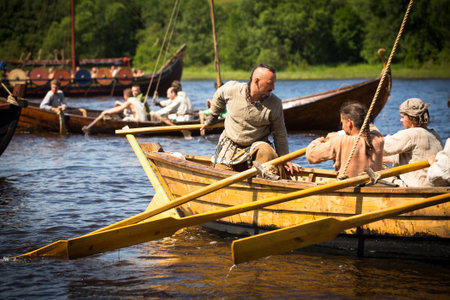 LADOGA, RUSSIA - JULY 13: During of international historical festival Ladogafest-2013 on July 13, 2013 on Ladoga, Russia. On 12-14 of July Ladoga festival will bring to life a viking age old harbour.のeditorial素材
