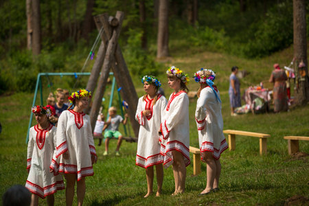 TERVENICHI, RUSSIA - JUL 7: Local people celebrated Ivan Kupala Day, Jul 7, 2013, Tervenichi, Russia. The celebration relates to the summer solstice and includes a number of fascinating Pagan rituals.のeditorial素材
