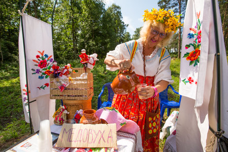 TERVENICHI, RUSSIA - JUL 7: Local people celebrated Ivan Kupala Day, Jul 7, 2013, Tervenichi, Russia. The celebration relates to the summer solstice and includes a number of fascinating Pagan rituals.のeditorial素材