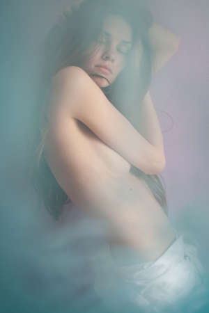 Young sexy girl in studio  blurring の写真素材