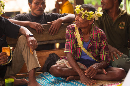 BERDUT, MALAYSIA - APR 8: Unidentified man Orang Asli in his village on Apr 8, 2013 in Berdut, Malaysia. More than 76% of all Orang Asli live below the poverty line, life expectancy - 53 years old.のeditorial素材