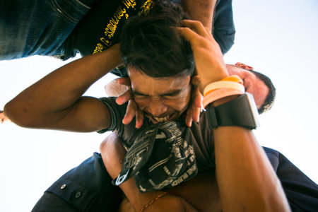 NAKHON CHAI, THAILAND - MAR 23: Unidentified participant Master Day Ceremony able Khong Khuen - spirit possession during the Wai Kroo at Wat Bang Pra on Mar 23, 2013 in Nakhon Chai, Thailand.のeditorial素材