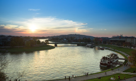 KRAKOW, POLAND - OCT 19: View of the embankment of Vistula River in the historic city center, Oct 19, 2013 in Krakow, Poland. Vistula is the longest river in Poland, at 1,047 kilometres (651 miles) in length.のeditorial素材