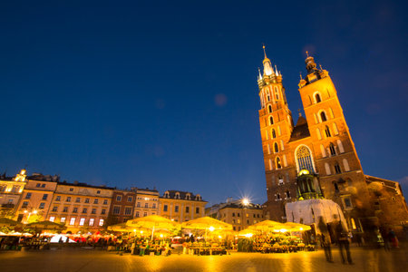 KRAKOW, POLAND - OCT 19: St. Mary's Church in historical center of Krakow, Oct 19, 2013 in Krakow, Poland. This year the city was visited by more 8.1 million tourists, which is the highest level.のeditorial素材