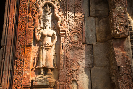 SIEM REAP, CAMBODIA - DEC 13: Apsaras - khmer stone carving in Angkor Wat, Dec 13, 2012 on Siem Reap, Cambodia. Angkor is the country's prime attraction for visitors.のeditorial素材