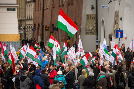 KRAKOW, POLAND - NOV 11: Unidentified participants celebrating National Independence Day an Republic of Poland, Nov 11, 2013 in Krakow, Poland. Is a public holiday, celebrated every year from 1918.のeditorial素材