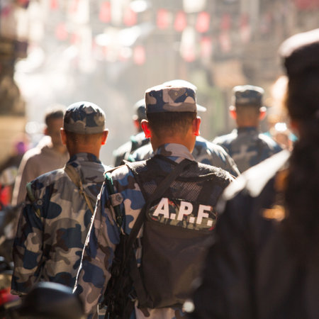 KATHMANDU, NEPAL - NOV 29: Soldiers during protest within a campaign to end violence against women (VAW), Nov 29, 2013 in Kathmandu, Nepal. Held annually since 1991, 16 days Nov 25 - Dec 10.のeditorial素材