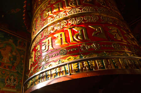 Big Spinning Tibetan Buddhist prayer wheel at Boudhanath stupa in Kathmandu, Nepal の写真素材