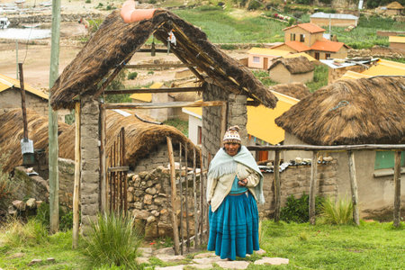 ISLA DEL SOL, BOLIVIA - JAN 21: Unidentified local Aymara woman in his village, Jan 21, 2011 on Isla del Sol, Bolivia. Main economic activity of 800 families on island is farming, fishing and tourism.のeditorial素材