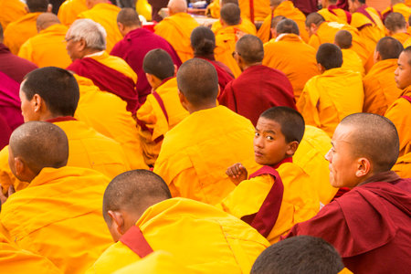 KHATMANDU, NEPAL - DEC 17: Unidentified tibetan Buddhist monks near stupa Boudhanath during festive...