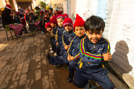 KATHMANDU, NEPAL - DEC 22: Unknown pupils during lesson in primary school, Dec 22, 2013 in Kathmandu, Nepal. Only only 25% of girls attend schools and half of the children can reach the 5 grade.のeditorial素材