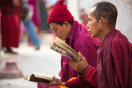 KATHMANDU, NEPAL - DEC 2: Unidentified pilgrims circle stupa Boudhanath, Dec 2, 2013 in Kathmandu, Nepal. Ancient Stupa is one of the largest in the world, of 1979 is a UNESCO World Heritage Site.のeditorial素材