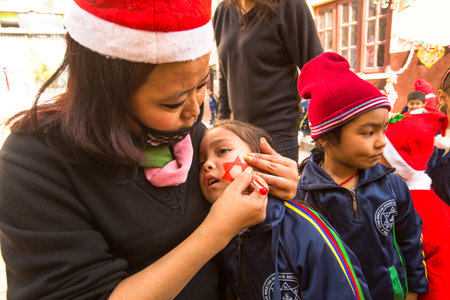KATHMANDU, NEPAL - DEC 22: Unknown pupils during lesson in primary school, Dec 22, 2013 in Kathmandu, Nepal. Only only 25% of girls attend schools and half of the children can reach the 5 grade.のeditorial素材