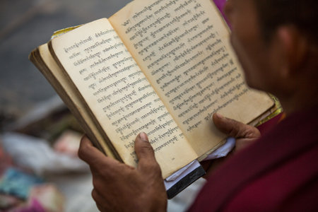 KATHMANDU, NEPAL - DEC 2: Unidentified pilgrims circle stupa Boudhanath, Dec 2, 2013 in Kathmandu, Nepal. Ancient Stupa is one of the largest in the world, of 1979 is a UNESCO World Heritage Site.のeditorial素材
