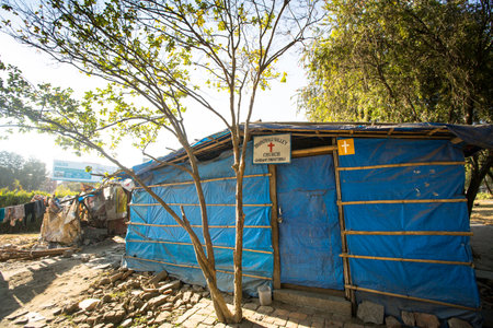 KATHMANDU, NEPAL - DEC 16, 2013: Illegal houses at slums in Tripureshwor district, Kathmandu. Caste of untouchables in Nepal, is about 7 % of population.のeditorial素材