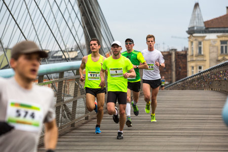 KRAKOW, POLAND - MAR 23, 2014: Unidentified participants during the annual Krakow  international Marathon. Krakow Marathon conducted since 2002 under the slogan: With history in the background.のeditorial素材
