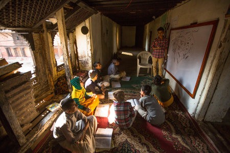 KATHMANDU, NEPAL - DEC 9, 2013: Unknown children in lesson at Jagadguru School. School established at 2013, to let new generation learn Sanskrit and preserve Hindu culture.
のeditorial素材