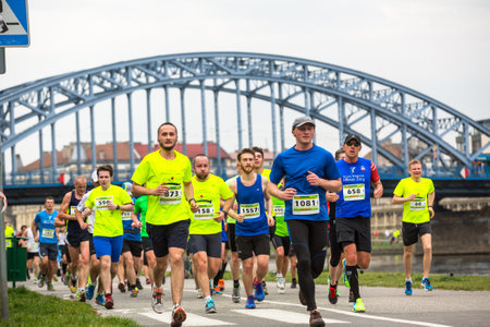 KRAKOW, POLAND - MAR 23, 2014: Unidentified participants during the annual Krakow international Marathon. Krakow Marathon conducted since 2002 under the slogan: With history in the background.のeditorial素材