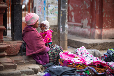 KATHMANDU, NEPAL - NOV 29, 2013: Unidentified street vendor in historic center of city. Largest city...