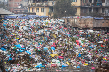 KATHMANDU, NEPAL - DEC 19, 2013: Pile of domestic garbage at landfills. Only 35% population of Nepal have access to adequate sanitation.のeditorial素材