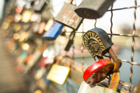 KRAKOW, POLAND - APR 8, 2014: Kladka Bernatka bridge of love with love padlocks. Footbridge Ojca Bernatka - bridge over the Vistula River. Bridge is 145 meters /700 tons.のeditorial素材