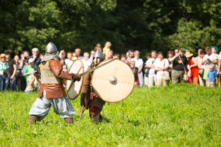 STARAYA LADOGA, RUSSIA - JULY 13: Unidentified participants during of international historical festival of medieval culture Ladogafest-2013 (12-14 of Jul) on July 13, 2013 on Staraya Ladoga, Russia.のeditorial素材