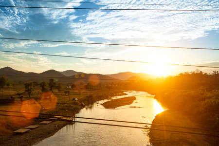 Beautiful sunset on the mountain river.の写真素材