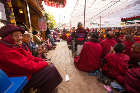 KHATMANDU, NEPAL - DEC 17: Unidentified tibetan Buddhist monks near stupa Boudhanath during festive Puja of H.H. Drubwang Padma Norbu Rinpoche's reincarnation's, Dec 17, 2013 in Khatmandu, Nepal.のeditorial素材