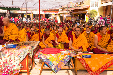 KHATMANDU, NEPAL - DEC 17: Unidentified tibetan Buddhist monks near stupa Boudhanath during festive Puja of H.H. Drubwang Padma Norbu Rinpoche's reincarnation's, Dec 17, 2013 in Khatmandu, Nepal.のeditorial素材