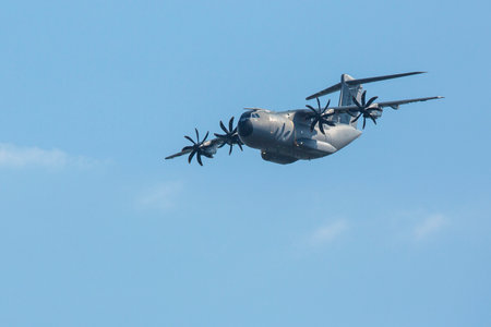 BERLIN, GERMANY - MAY 20, 2014: Four-engine turboprop military transport aircraft Airbus A400M (France) demonstration during the International Aerospace Exhibition ILA Berlin Air Show-2014.のeditorial素材