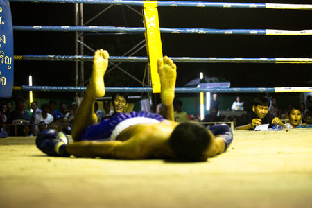 CHANG, THAILAND - FEB 22: Unidentified Muaythai fighter in ring during match, Feb 22, 2013 on Chang, Thailand.For many Thai men, is only way to break out of poverty, per battle pay to 7000 baht.のeditorial素材