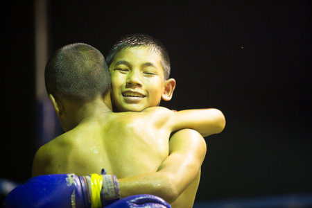 CHANG, THAILAND - FEB 22: Unidentified Muay Thai fighters compete in an amateur kickboxing match, Feb 22, 2013 on Chang, Thailand. Muay Thai practiced over 120000 fans and nearly 10000 professionals.のeditorial素材