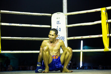 CHANG, THAILAND - FEB 22: Unidentified Muaythai fighter in ring during match, Feb 22, 2013 on Chang, Thailand.For many Thai men, is only way to break out of poverty, per battle pay to 7000 baht.のeditorial素材