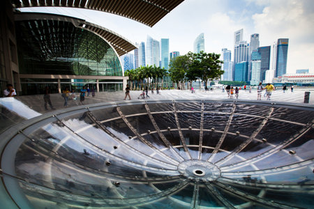 SINGAPORE - APRIL 15: A view of city in Marina Bay business district  on April 15, 2012 on Singapore. Asian financial center, the city state is one of the most dynamically developing countries in the world.のeditorial素材