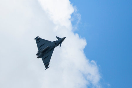 BERLIN, GERMANY - MAY 20, 2014: Multirole twin-engine fighter Eurofighter Typhoon (Germany), demonstration during the International Aerospace Exhibition ILA Berlin Air Show-2014.のeditorial素材