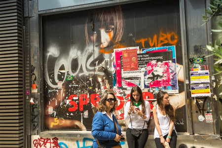 ATHENS, GREECE - MAY 10, 2014: Athenians and tourists in center of city. Tourism is a decisive sector of hope for Greek economy - In the year Greece receives about 18 million tourists.のeditorial素材