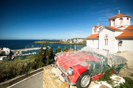 ANDROS, GREECE - APR 29, 2014: Marina of Andros, is the northernmost island of the Greek Cyclades archipelago in the Aegean Sea - area is 380 km2, 40 km long, and its greatest breadth is 16 km.のeditorial素材