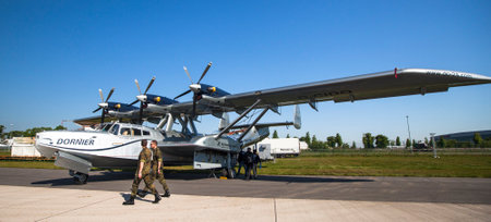 BERLIN, GERMANY - MAY 20, 2014: The Dornier Do 24 is a 1930s German three-engine flying boat for maritime patrol and rescue, demonstration during the International Aerospace Exhibition ILA Berlin Air Show-2014.のeditorial素材