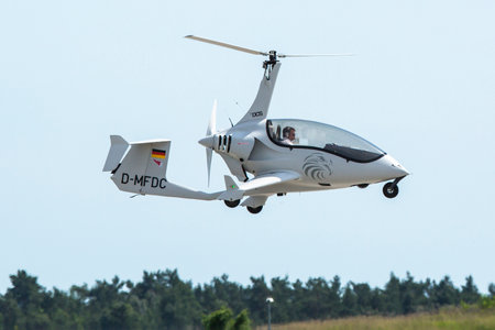 BERLIN, GERMANY - MAY 20, 2014: The Arrowcopter FD-Composites AC-10 (D-MFDC) helicopter, demonstration during the International Aerospace Exhibition ILA Berlin Air Show.のeditorial素材
